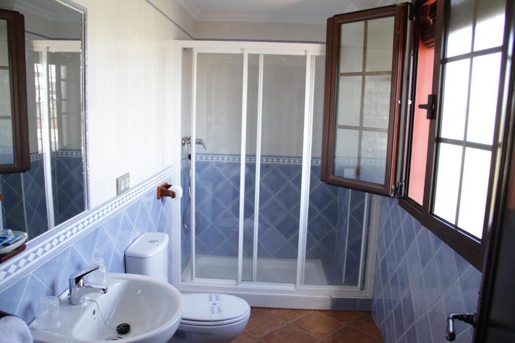 Hostal Pechi Huévar Quarto foto